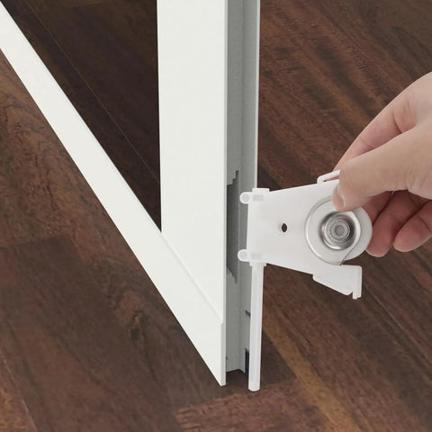 Built Tough Sliding Screen Door Lower Roller Assembly Compatible With Andersen Part Number 1997310 being installed in a sliding door.