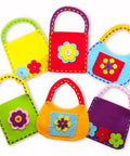 Colorful felt bags from Beginner Sewing Kit For Kids Ages 6 And Up Kid Friendly Sew Your Own Felt Bags With Handles Screen Free