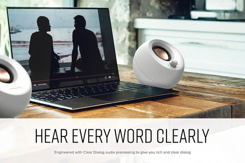 Pebble V3 2.0 USB C Desktop Speakers With USB Audio And Bluetooth 5.0, Crisp Dialog Boost, on a desk with laptop