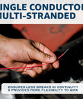 Hand holding 22 AWG UL1007 Tinned Copper Hook Up Wire 300V Single Conductor Multi Stranded, showing flexibility.