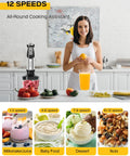Woman in kitchen with Six In One Immersion Blender With 1000W Motor And 12 Speed Settings, holding fruit with juice and ingredients