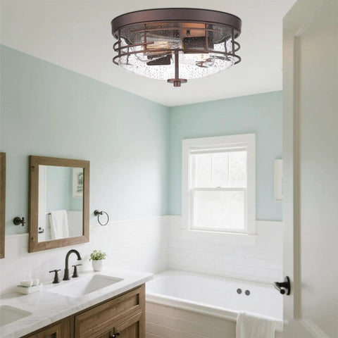 Oil Rubbed Bronze 2 Light Flush Mount Ceiling Light With Seeded Glass Industrial Close To Ceiling Fixture in bathroom setting