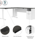 Heavy Hitter L Shaped Electric Standing Desk With Pretty Dang Smooth Motorized Lift And Scratch Resistant Deep Grey Top with USB socket and drawer.