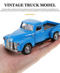 Pickup Truck Figurine Vintage Alloy Car Model Toy Sky Blue Retro Ornament For Christmas Table Centerpiece And New Year Decor Perfect Birthday Party Decor That Pops, held in hand for size reference.