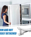 Heavy Duty Aluminum Refrigerator Shelf Clips And Freezer Shelf Hooks in use on a modern fridge, displaying firmness and durability.