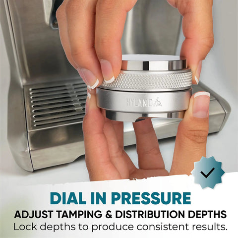 Hands holding 53mm Coffee Distributor And Tamper For 54mm Portafilters With Adjustable Depth And Dual Head Leveler near espresso machine