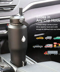 Built Tough 32 Oz Stainless Steel Water Bottle With Straw Cap And Wide Mouth Double Wall Vacuum Insulation Keeps Your Drinks Frosty Or Boiling Through Road Trips And Gym Hacks Without Drip Drama Slim Fit Slips Right Into Cup Holders Black in car's cup holder.
