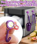 Heavy Duty Ice Scoop For Freezer With Magnetic Hook And Ice Tongs on stainless steel fridge demonstrating strong magnetic hold.