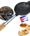 Traditional Cuban Sandwich Press Disquera De Pan Cubano 15 Inch Heavy Duty Cast Iron Grill with wooden handles on stove.