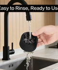 Rock Solid Tamper Base For Luxe Cafe Espresso Makers Japanese Silicone LSR Molded being rinsed under a faucet