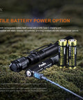 800 Lumen USB C Rechargeable AA Flashlight For EDC And Emergency Kits on moss with two AA batteries