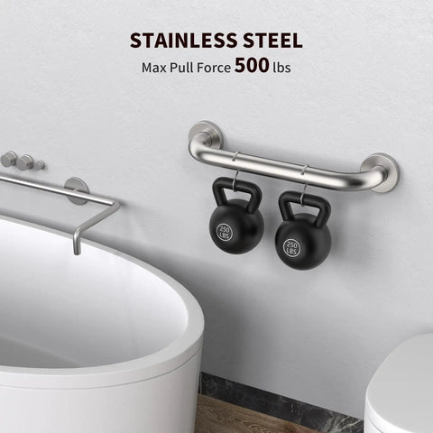 Stainless steel grab bar with kettlebells showcasing 500 lb pull force capacity near white bathtub in bathroom setting.