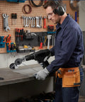 Man using Portable Electric Metal Sheet Cutter Attachment Drill Powered For Fast Roofing Repairs And DIY Metalworking Projects Heavy Duty Performance Quick Cutting Tool.