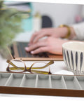 Keep Your Gear Sorted With This Hella Practical 3 Piece Wooden Sunglasses Display Stand Featuring Seven Grid Compartments And Soft Cloth Lining For Shades Jewelry And Watches on desk with glasses and coffee cup.