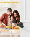 Matte Black Interior Door Lever With Square Plate installed on door, shown in kitchen setting with couple cooking