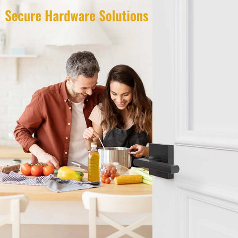 Matte Black Interior Door Lever With Square Plate installed on door, shown in kitchen setting with couple cooking