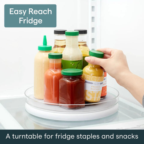 Hassle Free 360 Spin Fridge Turntable showcasing bottles and sauces on a round tray in fridge for easy access.