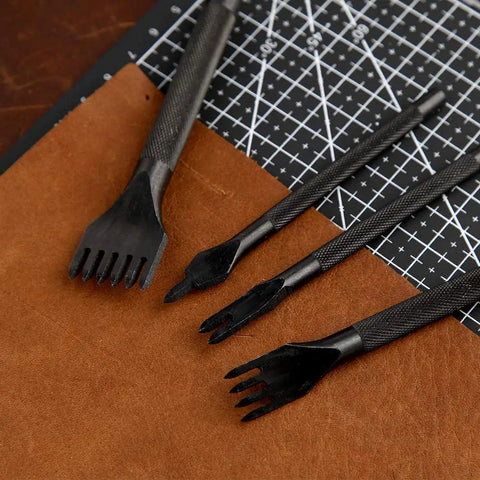 4 Piece Leather Stitching Punch Set With 1 2 4 6 Prongs on leather surface