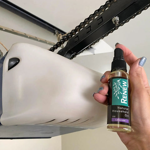 Person applying Renew Natural Household Oil Unscented All Purpose Lubricant Spray For Doors Hinges And Locks Eco Conscious.