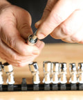 Close-up of hands using 12 Piece One Quarter Inch Drive Metric Flex Socket Set With 6 Point Sockets From 5mm To 15mm Built Tough