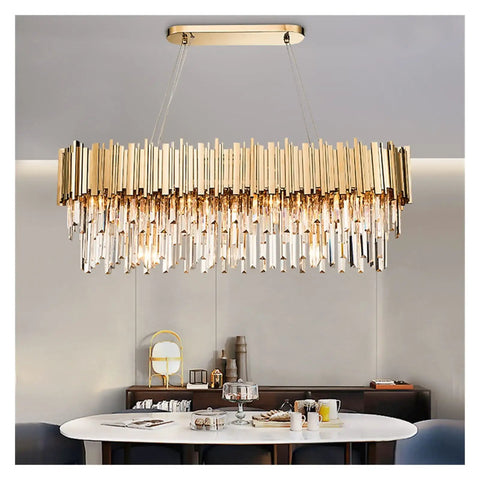 Top Notch Gold Chandelier With Genuine K9 Crystals, Eight Bulb Led Pendant Fixtures above a dining table.