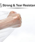 Heavy Duty Clear Cast Stretch Wrap 80 Gauge 19.7 X 6000 Ft Roll wrapped around a hand, demonstrating its strong and tear-resistant quality.