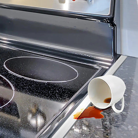 Stainless Steel Stove Gap Covers 2 Pack, Heat Resistant Kitchen Gap Filler For Counter And Appliances, shown with coffee spill.