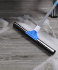 All In One Floor Squeegee With Long Adjustable Handle From 25 To 50 Inches No Bending Back Saver Heavy Duty Foam Blade Wiper For Concrete And Tile Floors Great For Garage Shower Kitchen Windows Glass Carpet And Pet Hair Cleanup in use on soapy floor