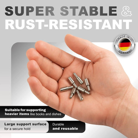 Rock Solid Cabinet Shelf Support Pegs With Grippy Anti Slip Ends Rustproof Steel Shelf Pins One Eighth Inch Three Millimeter Replacement Hardware For Kitchen Cabinets And Furniture Twenty Piece Package in hand.