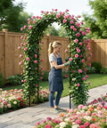 Gardener tending roses on Sturdy Iron Garden Pergola Arbor 7.9 Feet High By 4.6 Feet Wide With Freely Adjustable Two Size Options Ideal Wedding Garden Arch Or Bridal Party Decor For Climbing Plants Beefy Outdoor Metal Arch One Pack