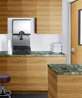 Smooth Operator Commercial Countertop Ice And Water Dispenser Yielding 282 Pounds Of Crisp Nugget Ice Daily With Eleven Pound Storage Plus Built In Filter Cartridge For Fast Paced Break Rooms And Clinic Waiting Areas in a modern kitchen setting.