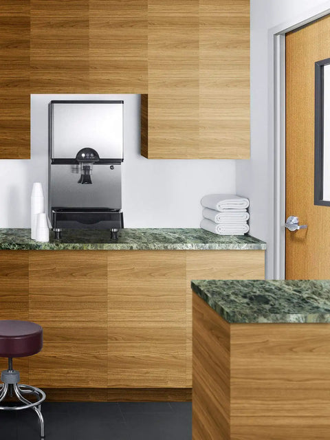 Smooth Operator Commercial Countertop Ice And Water Dispenser Yielding 282 Pounds Of Crisp Nugget Ice Daily With Eleven Pound Storage Plus Built In Filter Cartridge For Fast Paced Break Rooms And Clinic Waiting Areas in a modern kitchen setting.