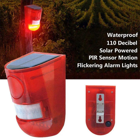 2 Pack Solar Security Light Alarm With IP65 Waterproof LED Motion Sensor and Flashing Outdoor Lamp on wooden post