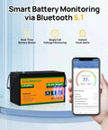 24V 100Ah LiFePO4 Deep Cycle Rechargeable Battery with Bluetooth app monitoring displayed next to smartphone app interface.