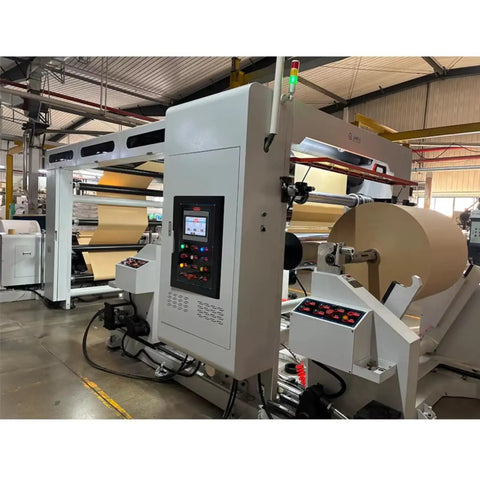 Industrial Smooth Operation Heavy Duty Automatic Jumbo Roll Slitter Machine Featuring Differential Slip Shaft For Insulation Paper Sheets setup with large roll.