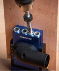 Workhorse Pocket Hole Drill Bit Set With Depth Stop Collar for precise woodworking, shown drilling into wood using a jig by POWERTEC
