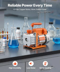 Front view of a 3-gallon stainless steel vacuum chamber with tempered glass lid and orange pump housing on a lab bench