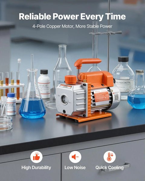 Front view of a 3-gallon stainless steel vacuum chamber with tempered glass lid and orange pump housing on a lab bench