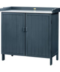Outdoor Storage Cabinet With Potting Bench And Metal Tabletop For Garden And Patio, Weatherproof Wooden Planting Workstation shown closed