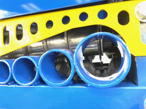 Close-up of Model 930 Motorized Wire Stripper Workhorse For Scrap Copper And Cable Reuse with blue cutting channels