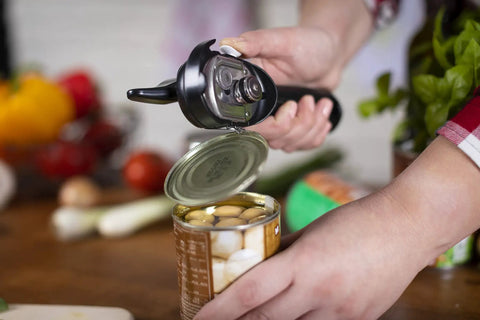 No-Touch Can Opener With Ring-Pull Tool And Auto Safety LidLifter Smooth-Edge Side-Cut Design For Safe Lid Removal Easy-Turn Handle Swiss Engineered Red opening a can