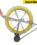 Heavy Duty 12mm Fiberglass Fish Tape With Reinforced Steel Core Non Conductive Cable Puller And Conduit Rodder on a wheeled cart for easy transport.