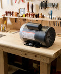 Beefy 1HP Air Compressor Electric Motor on workbench, 1725 RPM, 56 Frame, 5/8 inch shaft, single phase, TEFC, 115V/230V