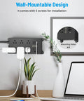 Wall-mounted 2 Prong To 3 Prong Power Strip With 7 Widely Spaced Outlets And 3 USB Ports Including USB C, black on desk.