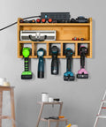 Drill Charging Station and Wall Mounted Tool Organizer For Power Tools with chargers and screws stored in wooden garage workshop organizer.