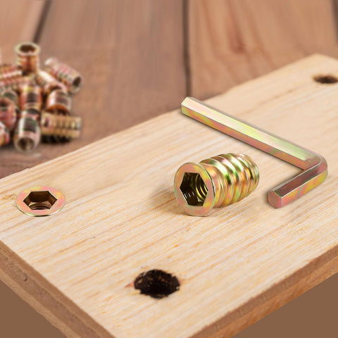 5/16-18 Threaded Inserts For Wood Nutserts For Furniture Screw-In Nut 25mm Length Hex Drive displayed on wooden board with tool