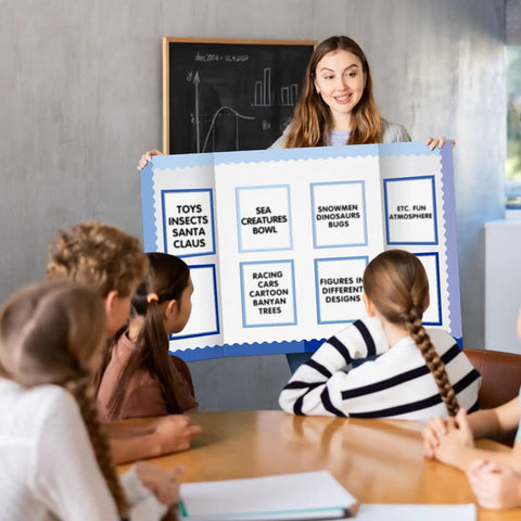 Teacher using 90 Piece Science Fair Board Supplies Set with 72 Scalloped Bulletin Borders and 18 Sheets of Presentation Subtitle Stickers.