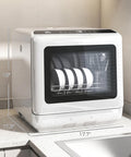 Game Changing Portable Countertop Dishwasher Featuring A Built In Water Tank And Five Wash Cycles To Run Slick And Spotlessly Clean Up To Twenty Eight Pieces For Tight Kitchens And Dorm Layouts displayed on a kitchen countertop with dimensions.