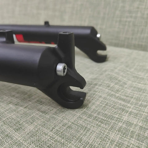 Close-up of Beefy 26 Inch Fat Bike Fork 4.0 Suspension with 135mm dropout, disc brake ready, aluminum alloy construction.