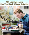 Man using 15X Magnifying Glass Desk Lamp With Clamp Real Glass Lens Dust Cover 84 LEDs 5 Color Modes 10 Brightness Levels